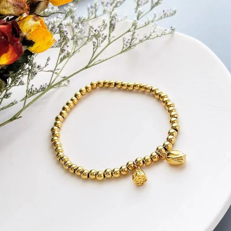 Grosir Gelang Manik Bunga Teratai Emas untuk Wanita – Baja Tahan Karat, Elegan, Anti Karat - 我的商店