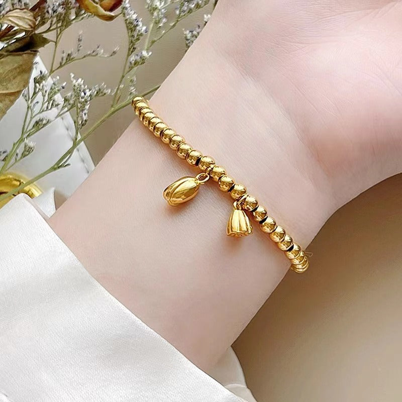 Grosir Gelang Manik Bunga Teratai Emas untuk Wanita – Baja Tahan Karat, Elegan, Anti Karat - 我的商店