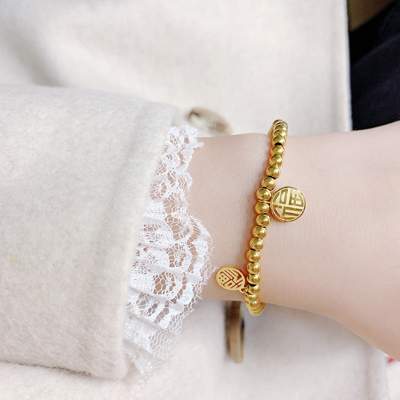 Gelang Lucky Charms 2025 Wanita - Manik Emas 18k & Simbol 'FU' Pembawa Kebahagiaan, Gelang Stainless Steel Elegan, Grosir Harga Terbaik4