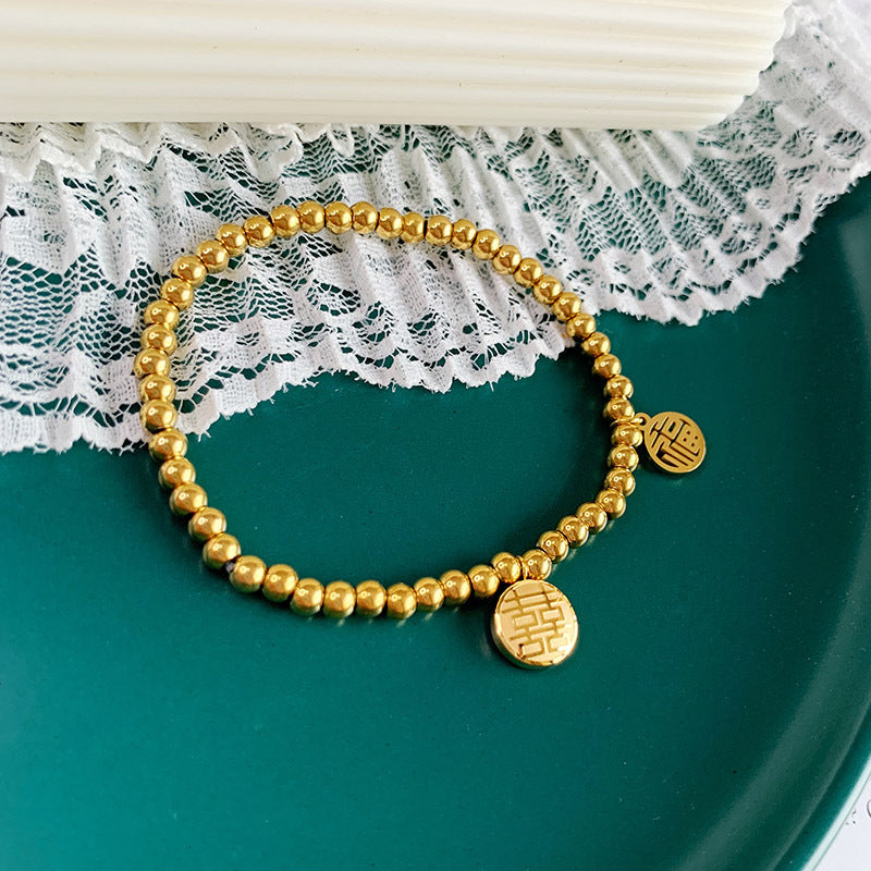 Gelang Lucky Charms 2025 Wanita - Manik Emas 18k & Simbol 'FU' Pembawa Kebahagiaan, Gelang Stainless Steel Elegan, Grosir Harga Terbaik6