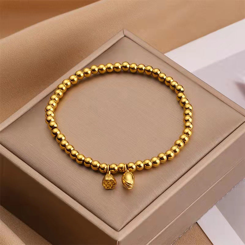 Grosir Gelang Manik Bunga Teratai Emas untuk Wanita – Baja Tahan Karat, Elegan, Anti Karat - 我的商店