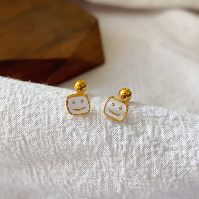 Anting Wajah Senyum Putih Baja Stainless perhiasandirect