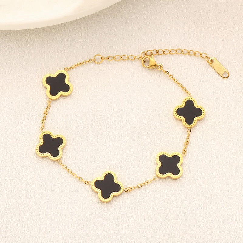 Gelang Four Leaf Clover untuk Wanita – hitam Tampak depan, stainless steel warna emas