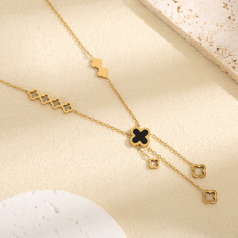 Kalung Wanita Titanium Baja Four-Leaf Clover – Liontin Berongga dengan Rumbai Elegan, Gaya Kekinian perhiasandirect