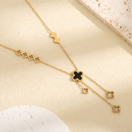 Kalung Wanita Titanium Baja Four-Leaf Clover – Liontin Berongga dengan Rumbai Elegan, Gaya Kekinian perhiasandirect