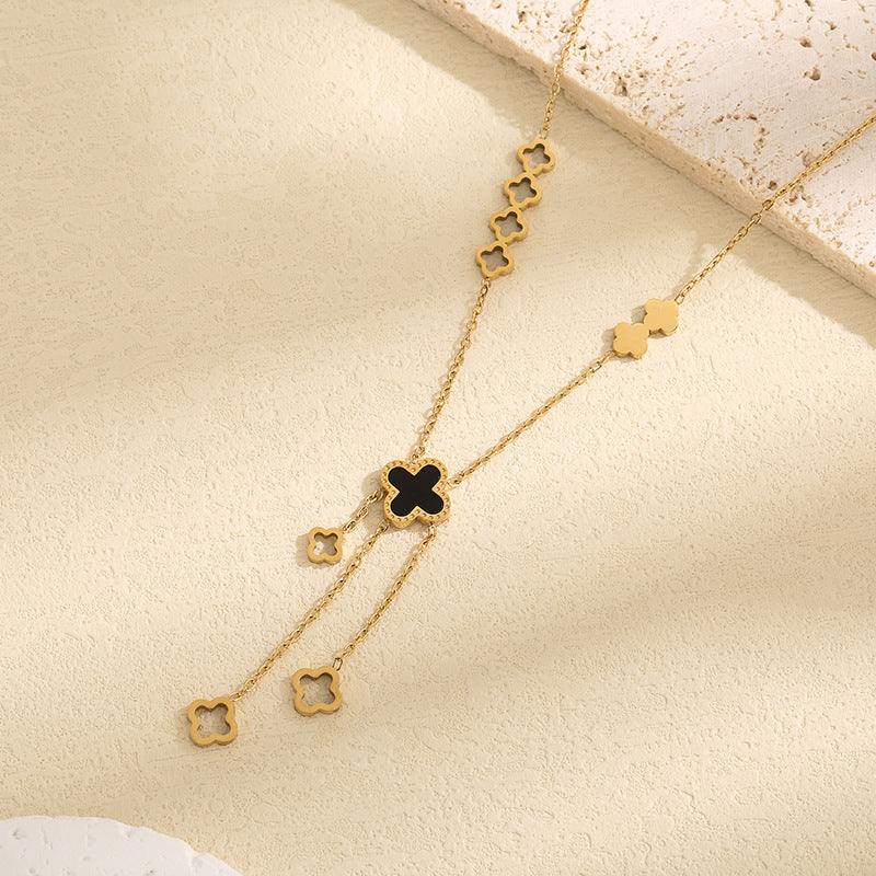 Kalung Wanita Titanium Baja Four-Leaf Clover – Liontin Berongga dengan Rumbai Elegan, Gaya Kekinian perhiasandirect
