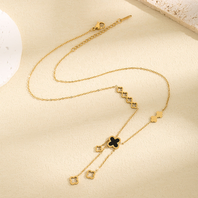 Kalung Wanita Titanium Baja Four-Leaf Clover – Liontin Berongga dengan Rumbai Elegan, Gaya Kekinian perhiasandirect