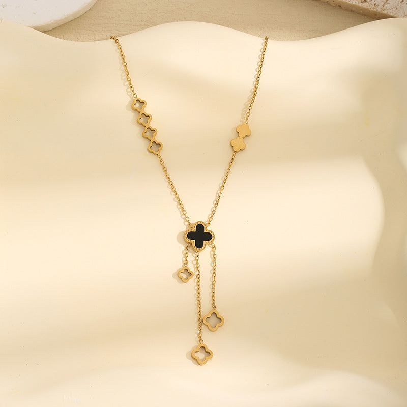 Kalung Wanita Titanium Baja Four-Leaf Clover – Liontin Berongga dengan Rumbai Elegan, Gaya Kekinian perhiasandirect