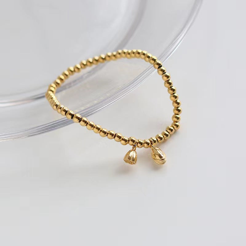 Grosir Gelang Manik Bunga Teratai Emas untuk Wanita – Baja Tahan Karat, Elegan, Anti Karat - 我的商店