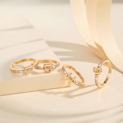 Cincin Kristal Huruf Wanita – Berlapis Emas, Bisa Disesuaikan & Elegan perhiasandirect