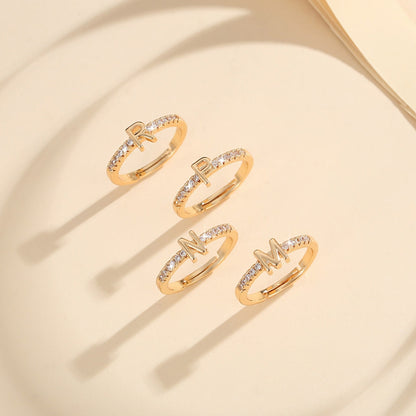 Cincin Kristal Huruf Wanita – Berlapis Emas, Bisa Disesuaikan & Elegan perhiasandirect