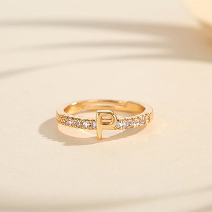 Cincin Kristal Huruf Wanita – Berlapis Emas, Bisa Disesuaikan & Elegan perhiasandirect