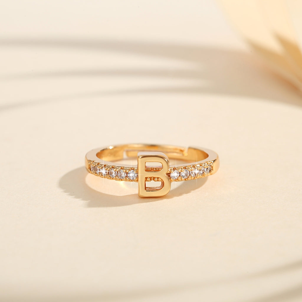 Cincin Kristal Huruf Wanita – Berlapis Emas, Bisa Disesuaikan & Elegan perhiasandirect