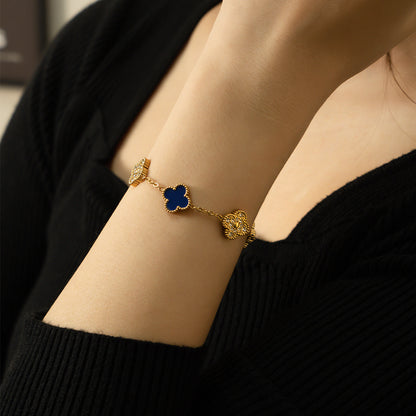 Gelang tangan titanium rantai motif bunga four-leaf clover permata bolak balik Uk 13mm - perhiasandirect