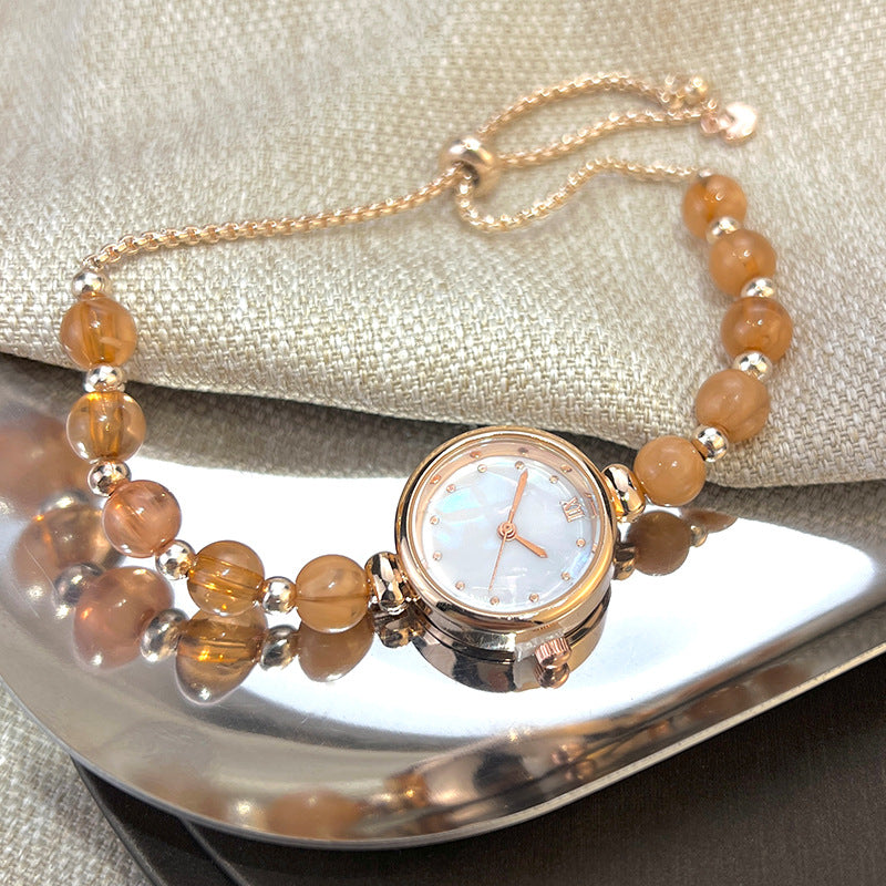 Jam tangan kuarsa wanita gelang mutiara dengan desain ceruk, ringan, mewah, dial kecil, dan dapat ditarik keluar7