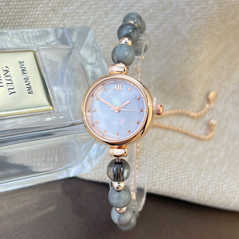Jam tangan kuarsa wanita gelang mutiara dengan desain ceruk, ringan, mewah, dial kecil, dan dapat ditarik keluar8