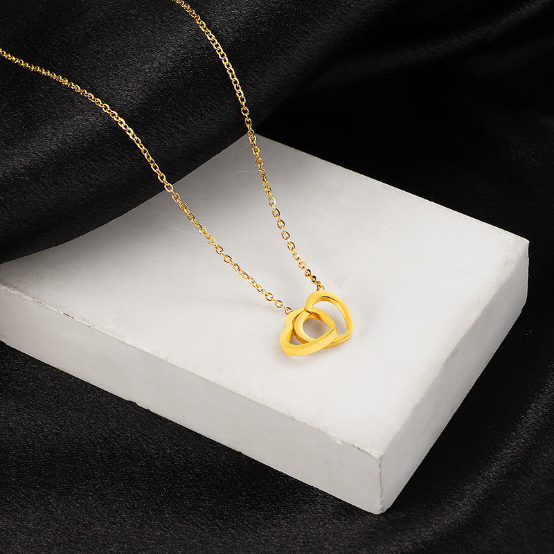 Kalung Titanium Double Heart – Desain Unik Double Ring, Gaya Kekinian perhiasandirect