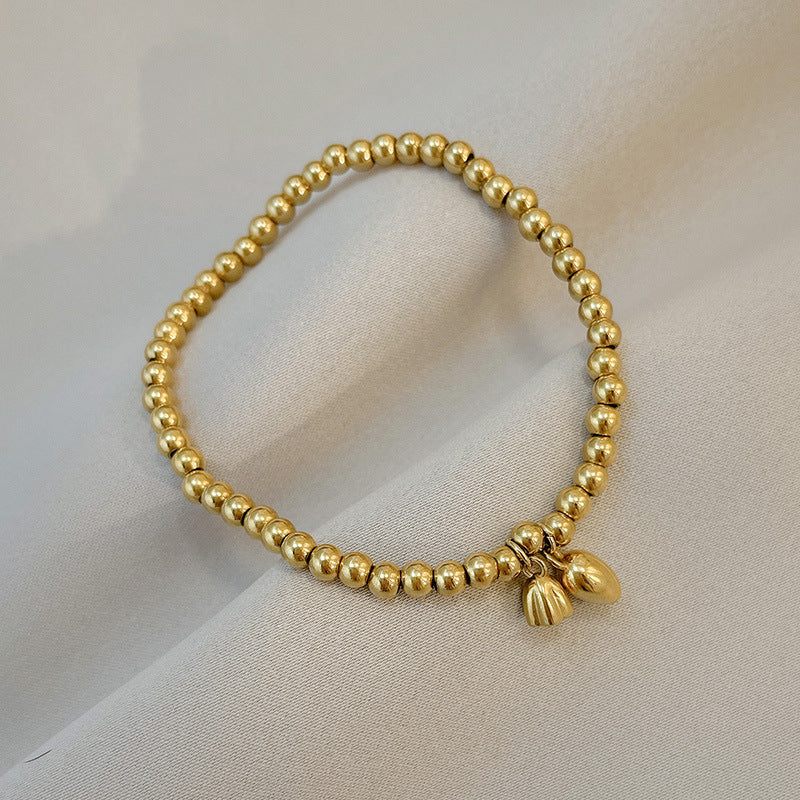 Grosir Gelang Manik Bunga Teratai Emas untuk Wanita – Baja Tahan Karat, Elegan, Anti Karat - 我的商店